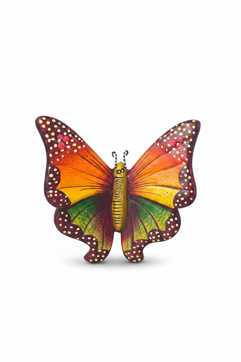 Colorful butterfly figurine on a white background